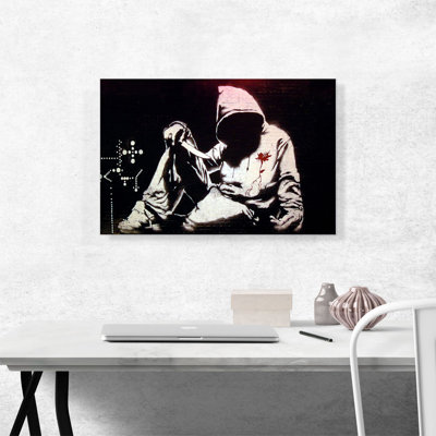 «Hooded Man with Knife» par Banksy - reproduction d'art sur toile tendue