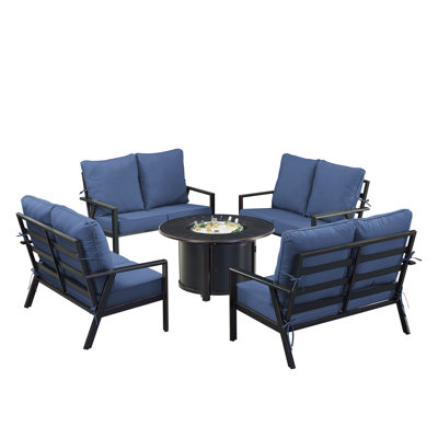 Ensemble de table de foyer en aluminium noir avec quatre causeuses profondes