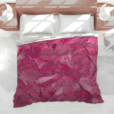 Édredon rose texturé abstrait