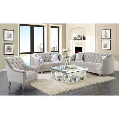 Causeuse grise grise contemporaine avec capitonnage