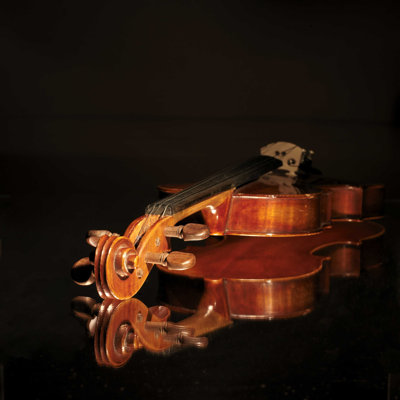 " Close-Up Of An Old Violin "