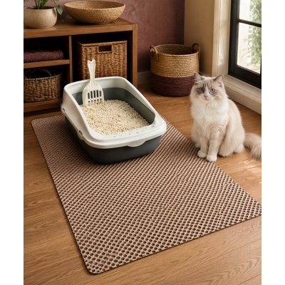 Cut this large 35 x 23 litter trapping mat to fit any place as needed; the khaki litter box pad is waterproof, non-slip, easy to clean, and designed for scatter control that protects the floor.
