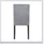 Ensemble de salle à manger 5 pièces avec table à finition noire et 4 chaises en velours gris, alliant élégance décontractée et durabilité moderne pour toute salle à manger.