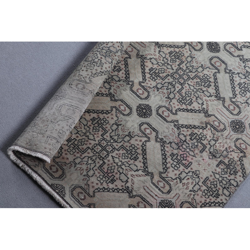 Tapis turc vert antique avec un design bohème rustique pour rehausser l'esthétique de votre salon