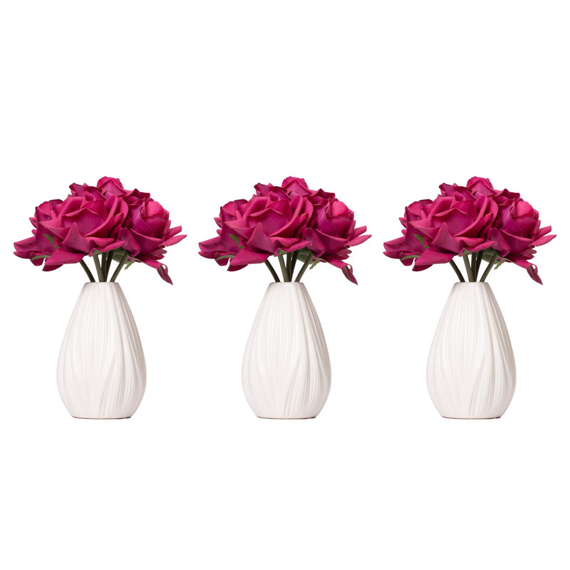 10" Purple Rose Arrangement In An Off White Ceramic Vase - 3 Pack