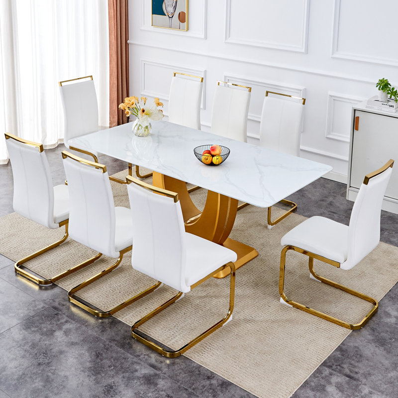 Ensemble de table et de chaises moderne et minimaliste moderne avec table de salle à manger rectangulaire blanche luxueuse et chaises douces et confortables, idéales pour les salles à manger, les salons, les terrasses et les cuisines, alliant design é