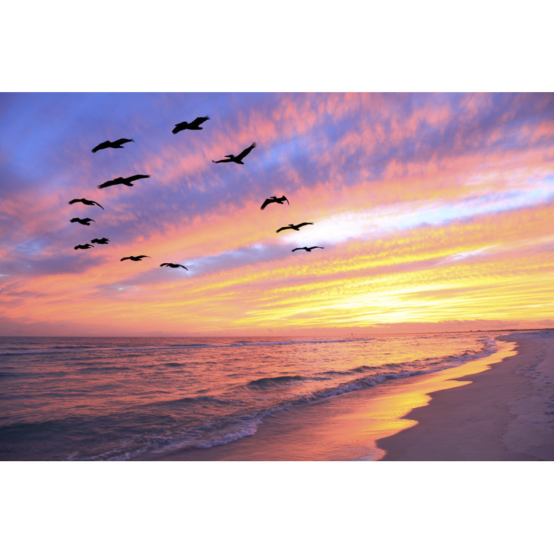 Flock Of Pelicans Fly Over The Beach At Sunset by Sdbower - Wrapped Canvas Print, 20cm H x 30cm W x 3.8cm D