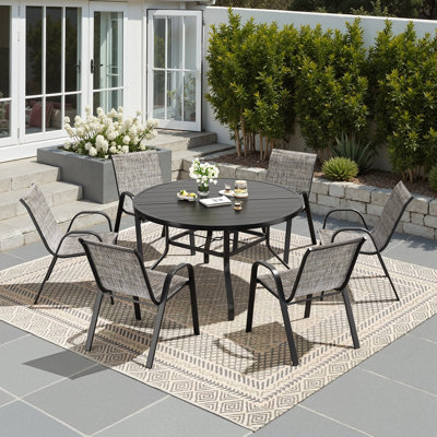 Ensemble de salle à manger de patio pour 6 personnes avec table ronde de 47 pouces et 6 fauteuils empilables