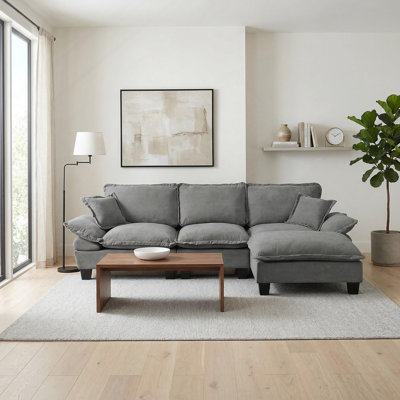 Sailboat-Inspired Modular Cloud Sofa With Removable Ottoman