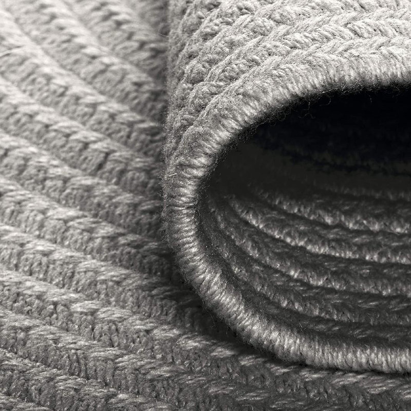 Tapis ovale tressé à la main abstrait 7 pi x 9 pi gris abstrait