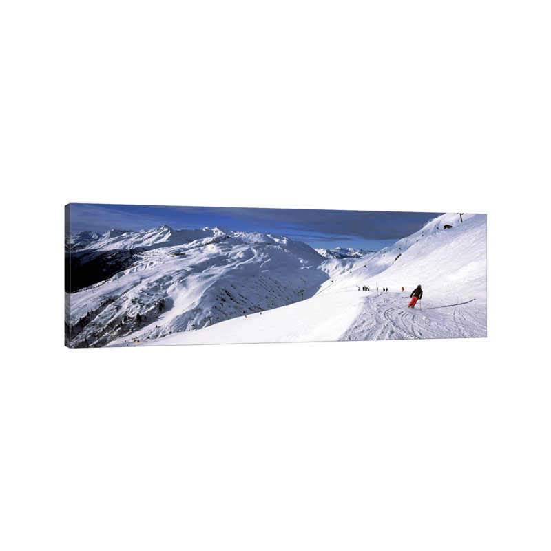 Tourists Skiing In A Ski Resort, Sankt Anton Am Arlberg, Tyrol, Austria by Panoramic Images - Wrapped Canvas Panoramic Print