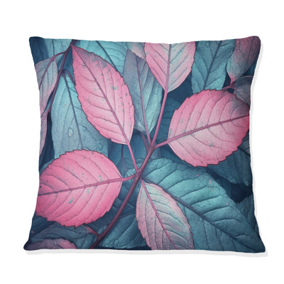 Coussin rose à imprimé floral feuille de splendeur rose
