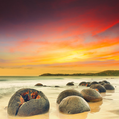 Moeraki Boulders by GoodOlga - Wrapped Canvas Print