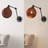 Abdulmalik 22" 1-Light Mid-Century Vintage Rattan Globe Swing Arm LED Sconce