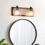 Luminaire de salle de bain à intensité variable Modern Farmhouse avec verre ensemencé et contre-plaque en placage de bois-179862210-176119489