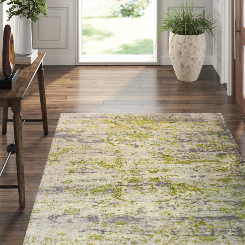 Raza Abstract Area Rug in Green, Rectangle 5'9" x 9'
