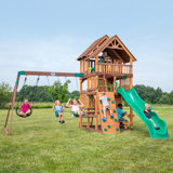 Backyard Discovery Highlander Cedar Wood Swing Set with Wave Slide, Three-Story Clubhouse, Rock Wall, and Picnic Table