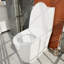 Toilette allongée une pièce à double chasse 1,6 GPF (siège inclus)