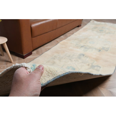 Tapis de couloir turc chic avec motifs géométriques aux tons doux pour un accent de couloir élégant