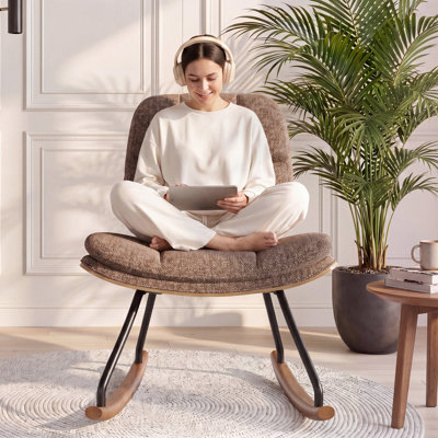Fauteuil à bascule rembourré moderne