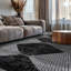 Tapis noir à rayures géométriques ivoire-1160973102