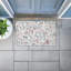 Tapis de porte d'extérieur imprimé Wildflower Hope Botanicals, design par Kim Allen, 18 po x 30 po