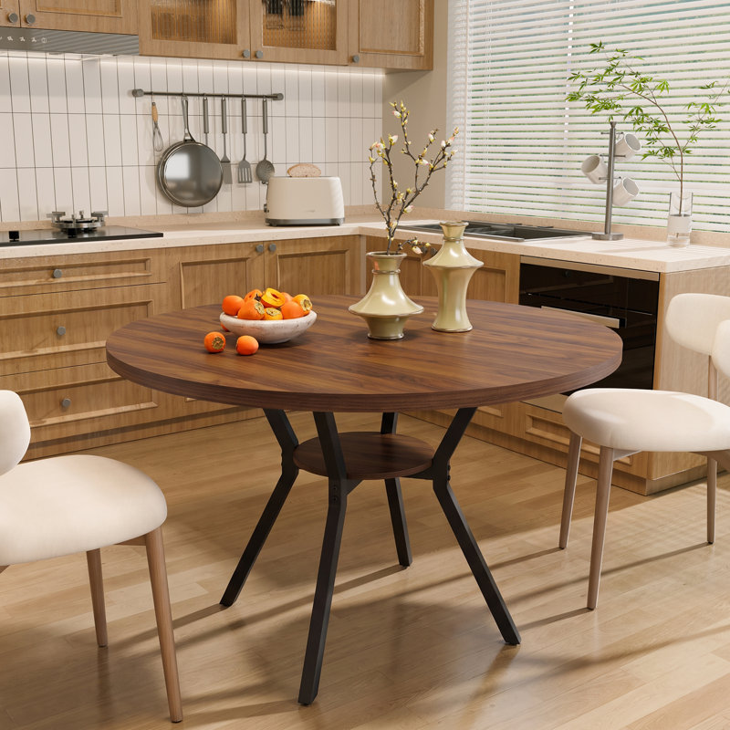 Table de salle à manger ronde de 107 cm de diamètre avec tablette de rangement et piètement en métal pour 4 personnes.