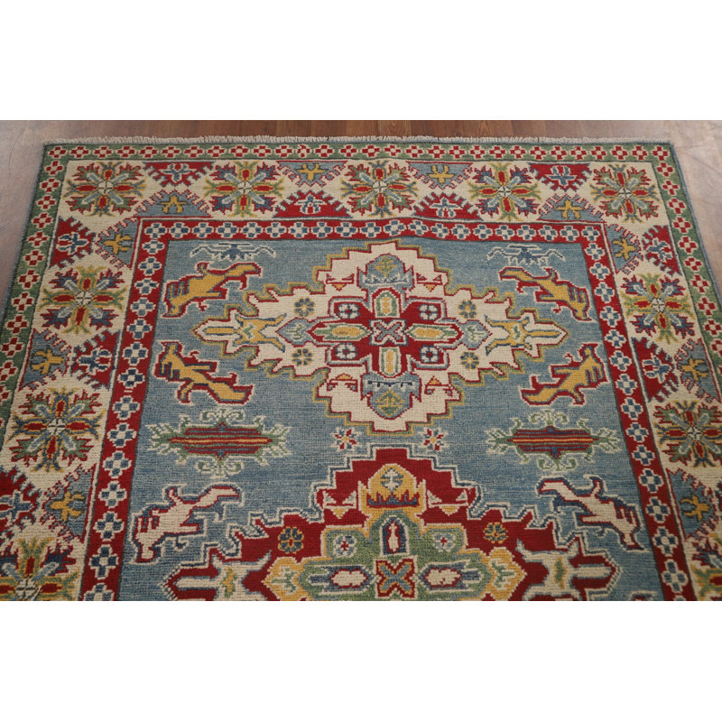 Tapis bleu clair à motif géométrique Kazak