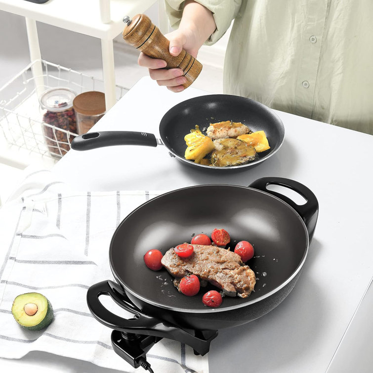 https://assets.wfcdn.com/im/03201979/resize-h755-w755%5Ecompr-r85/2526/252613380/OVENTE+18%22+Electric+Wok+and+Skillet.jpg