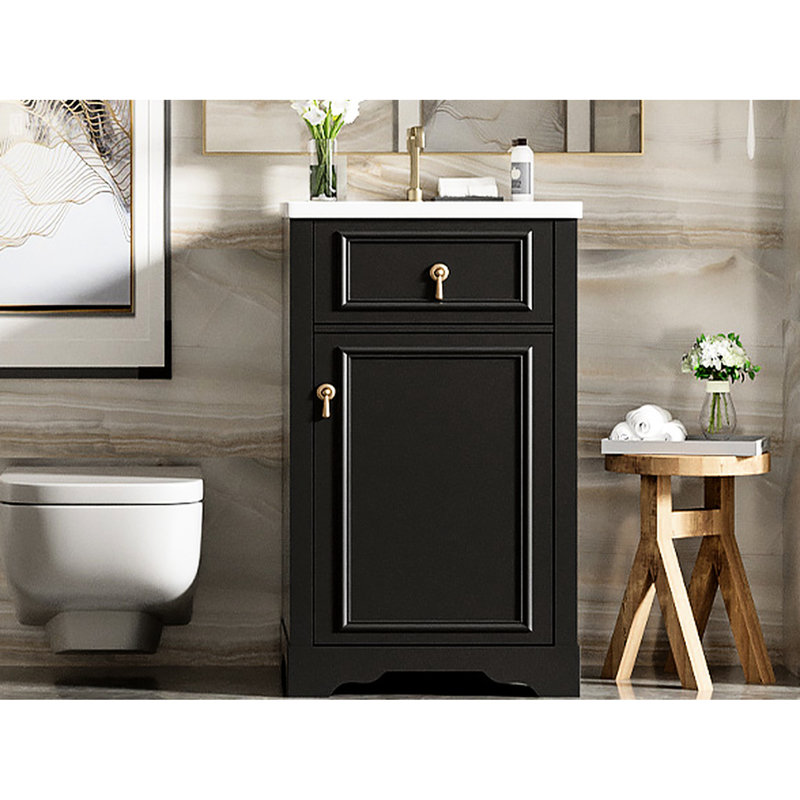 Meuble-lavabo de 20 pouces avec lavabo en céramique. Compact et élégant. Protection contre le débordement. Étagère réglable à fixation sur porte. Finition noire. Évier de construction, porte à fermeture en douceur, rangement pour un espace serein