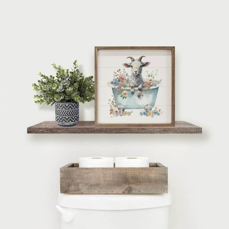Chèvre blanche avec des fleurs bleues