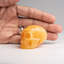 Polished Orange Calcite Skull Carving (127.4 Grams)