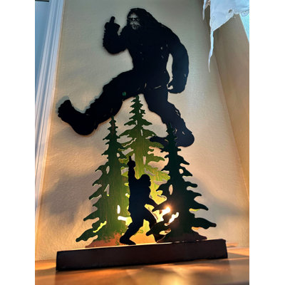 Rustic lodge black metal Bigfoot flipping the bird wall sculpture with laser-cut silhouette — 16.75 in. L x 0.25 in. D x 24.75 in. H