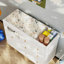 Commode à langer avec 4 tiroirs Stroman-640813350