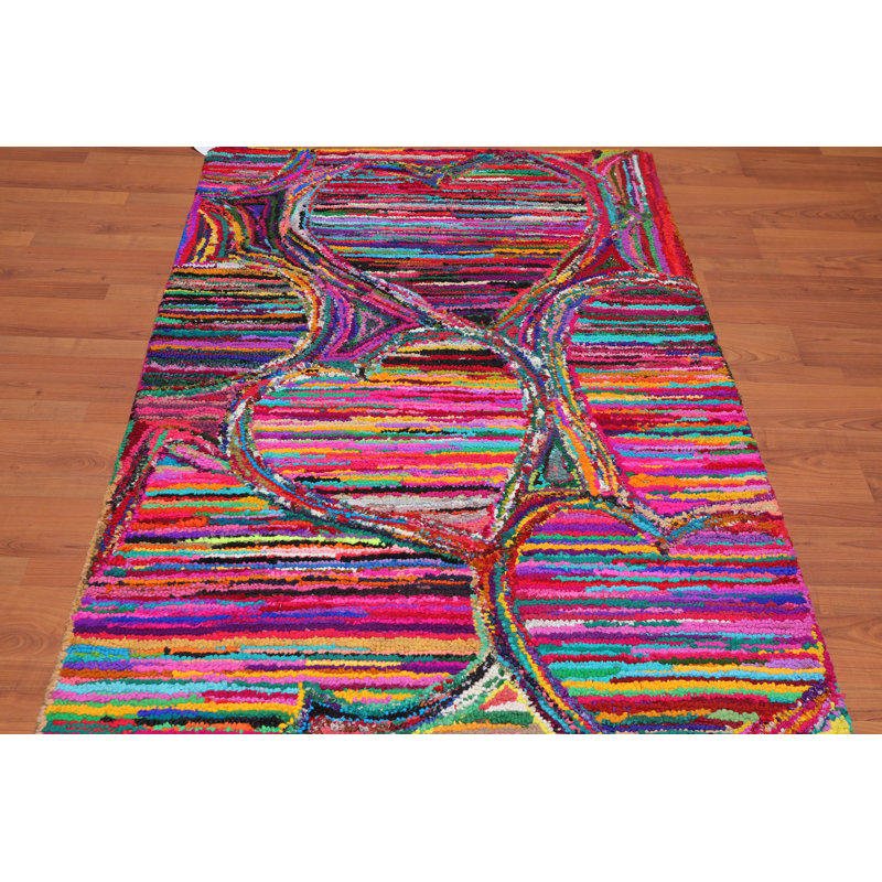 Tapis rose en coton touffeté fait main