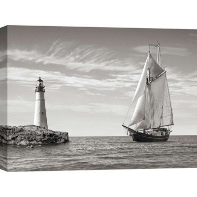 Photograph Of A Sailboat Approaching Lighthouse, Mediterranean Sea by Pangea Images - Print