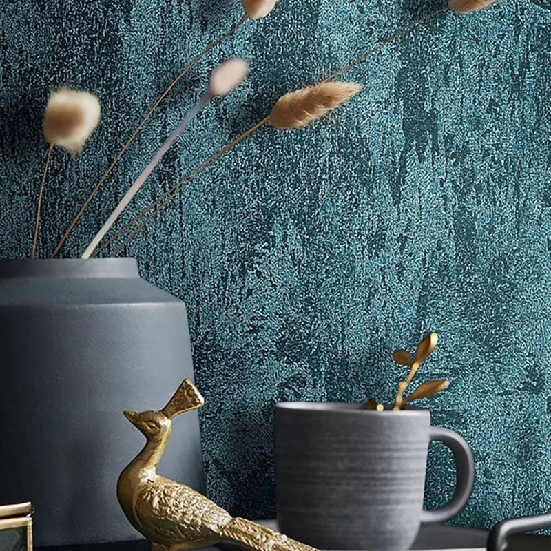 Papier peint texturé plâtre uni bleu sarcelle