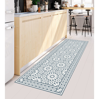 Abhirami Vinyl Machine Printed Area Rug