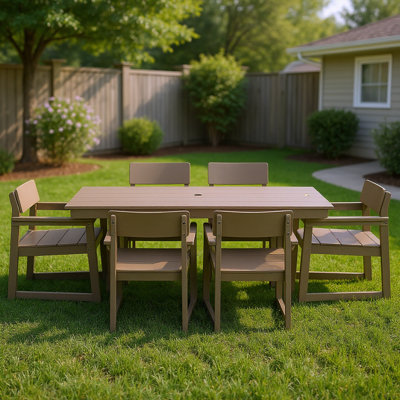 HDPE Outdoor Dining Set With Weather-Resistant Patio Table And Armrest Chairs by Hokku Designs