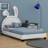 Upholstered Platform Bed With Rabbit Ornament-568589944