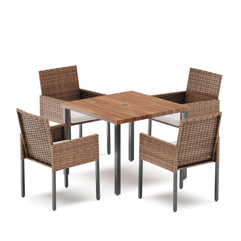 Ensemble repas pour 4 personnes avec table rectangulaire en osier Aljaquan, coussins inclus