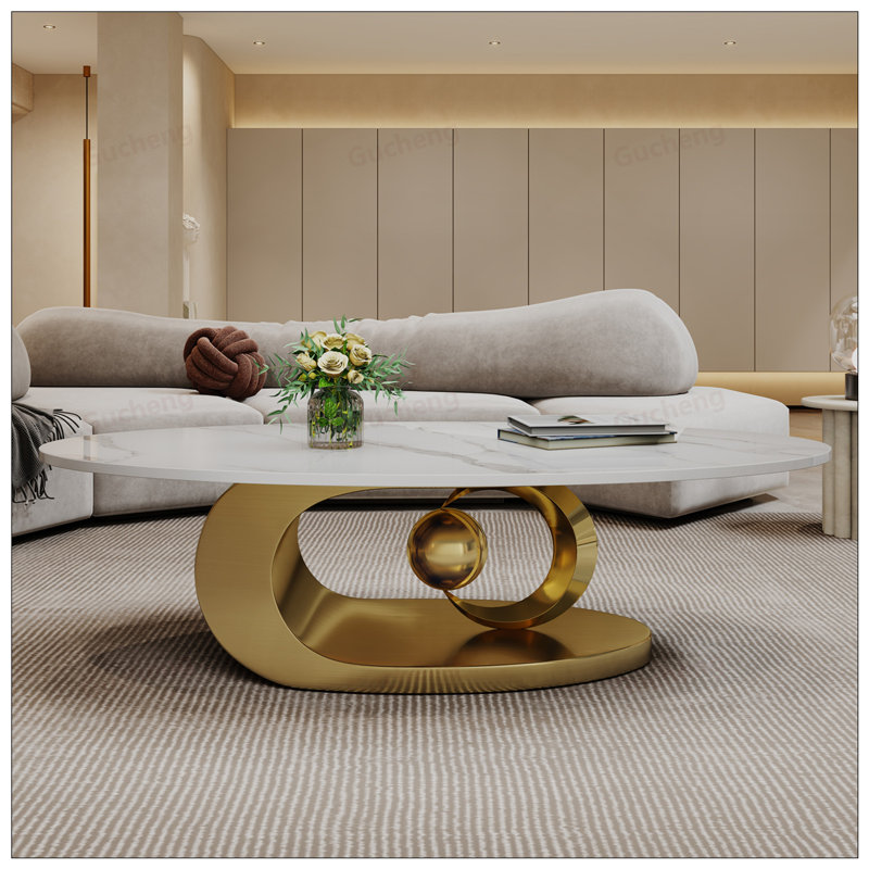 Table basse sculpturale en acier inoxydable sculpturale, résistante aux rayures et à la chaleur, idéale pour les espaces modernes et minimalistes.