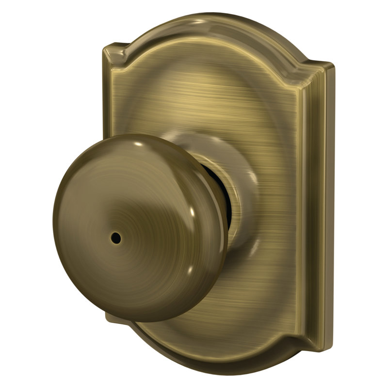 Plymouth Knob with Camelot Trim Bed and Bath Lock, Antique Brass