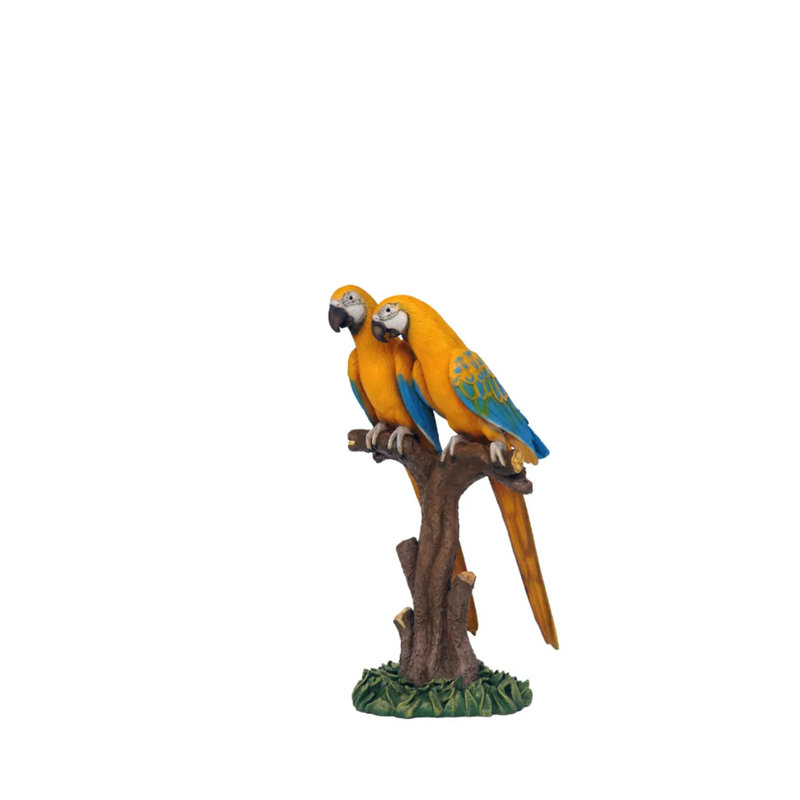 Statue jaune grandeur nature perroquets sur branche