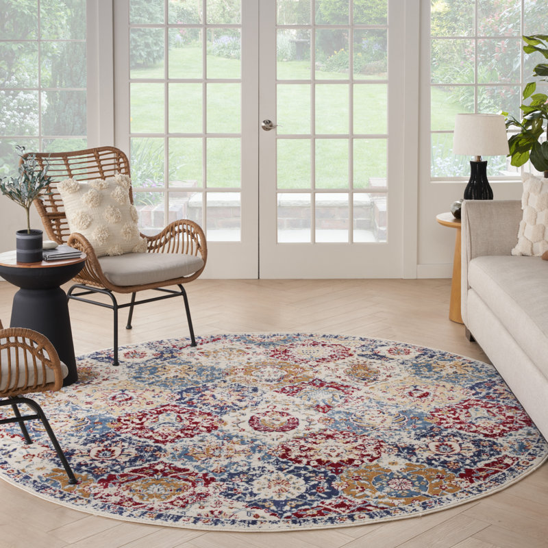 Tapis oriental en polypropylène tissé à la machine en rouge / ivoire / bleu Martese, Rond 5 pi 3 po