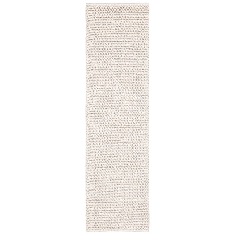 Charvik Solid Color Handmade Area Rug in Ivory