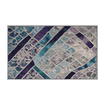 Tapis gris lavable à la machine