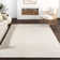 Dunanney Hand Braided Ivory Area Rug