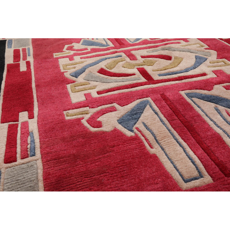 Tapis noir / rose en laine tissé à la main