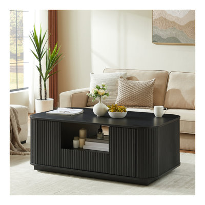 Table basse ovale de luxe moderne de 46,5 po avec tiroirs et compartiments de rangement.